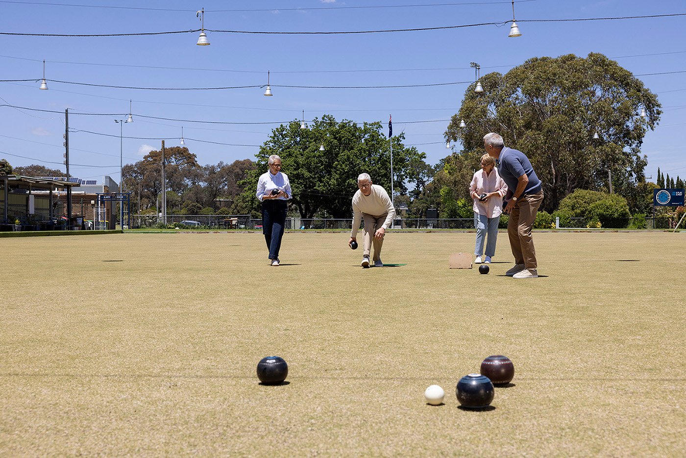 St. Francis resident bowling with friends at East Ivanhoe Bowls Club